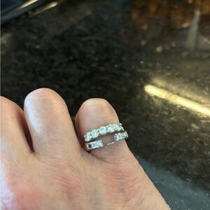 Anniversary band and diamond enhancer rings